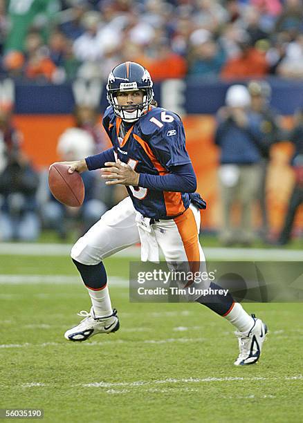 Quarterback Jake Plummer of the Denver Broncos looks to pass downfield in a game against the Philadelphia Eagles on October 30, 2005 at Invesco Field...