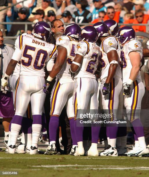 Head Coach Mike Tice of the Minnesota Vikings speaks with his team during a timeout against the Carolina Panthers on October 30, 2005 at Bank Of...