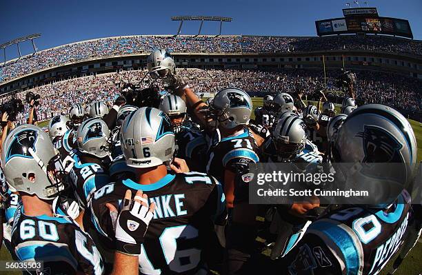 The Carolina Panthers huddle before the game against the Minnesota Vikings on October 30, 2005 at Bank Of America Stadium in Charlotte, North...