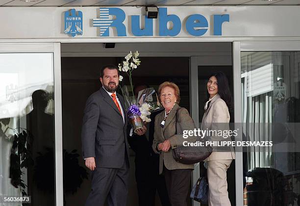 Spain's Princess Letizia's grandmother Menchu Alvarez , father Jesus Ortiz with his fiance Marta Tagore smile as they arrive to pay a visit to see...