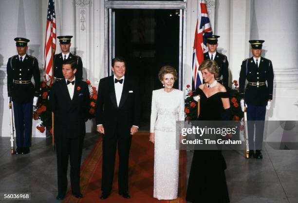 In this file photo issued October 31 Prince Charles, the Prince of Wales and Princess Diana, the Princess of Wales meet President Ronald Reagan and...