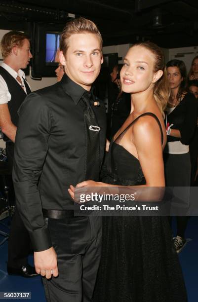 Calvin Klein model Natalia Vodianova and singer Lee Ryan are seen backstage during the Swarovski Fashion Rocks for The Prince's Trust event at the...