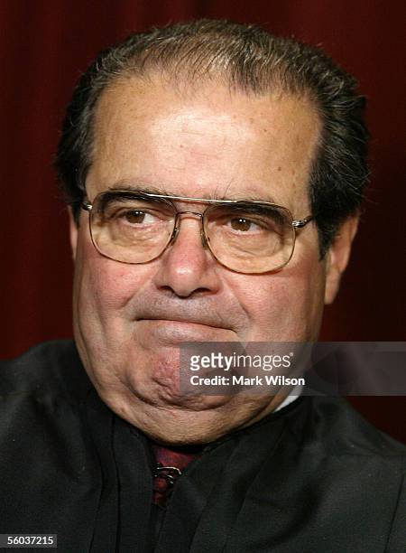 Justice Antonin Scalia poses for photographers at the U.S. Supreme Court October 31, 2005 in Washington DC. Earlier in the day U.S. President George...