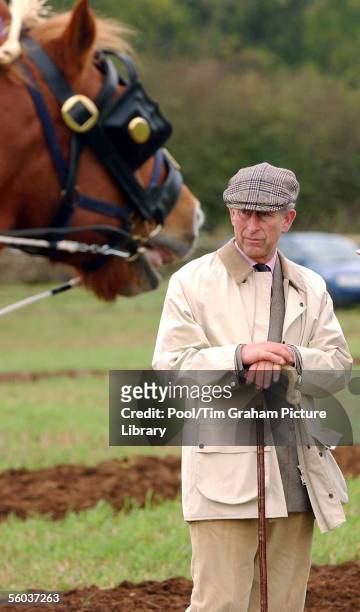 Prince Charles wears casual clothes for a visit to a hedgelaying competition at his Duchy of Cornwall farm, Home Farm, on October 29, 2005 in...