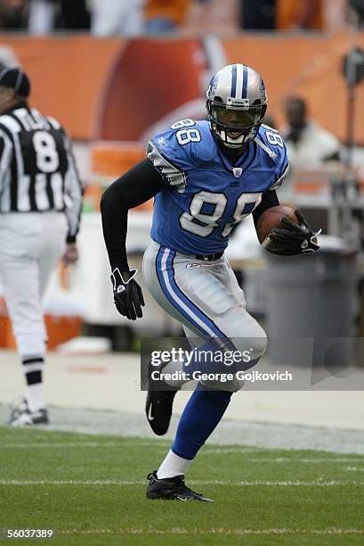 Wide receiver Mike Williams of the Detroit Lions runs with the ball after making a catch during pregame warmup prior to a game against the Cleveland...