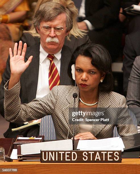 Secretary of State Condoleezza Rice casts her vote during a Security Council meeting on Syria October 31, 2005 at the United Nations in New York...