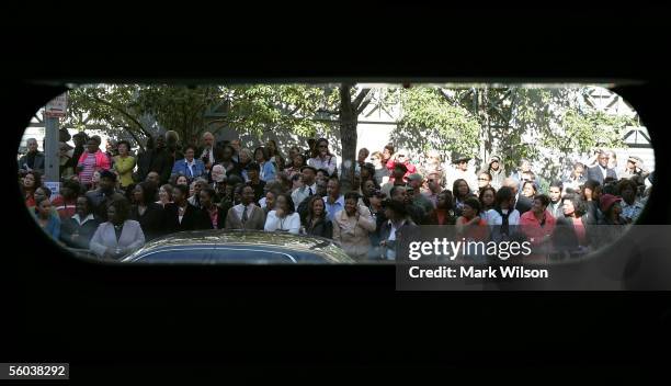 Ten-year-old Mishaew Washington of Hyattsville, Maryland sits in a vintage 50's era bus in front of the Metropolitan AME Church during a memorial...