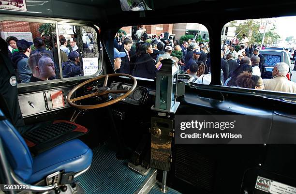 Ten-year-old Mishaew Washington of Hyattsville, Maryland sits in a vintage 50's era bus in front of the Metropolitan AME Church during a memorial...