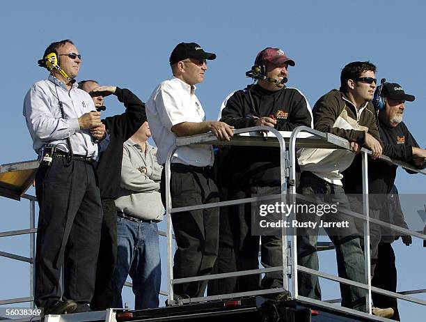 Jimmy Makar of Joe Gibbs Racing and Steve Hemiel, Tony Eury Jr., Martin Truex Jr., and Tony Eury Sr. Of DEI look on as Dale Earnhardt Jr. Tests the...