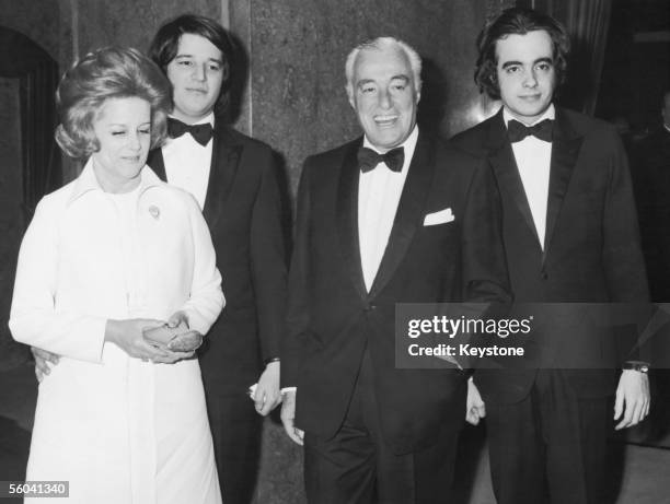 Italian actor-director Vittorio de Sica attends the premiere of his latest film 'I Girasoli' at the opera house in Rome, 14th March 1970. With him...