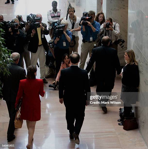 The media covers the arrival of Samuel A. Alito with Jamie Brown , Special Assistant to the President for Legislative Affairs and Dan Coats , former...