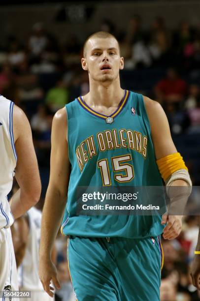 Maciej Lampe of the New Orleans/Oklahoma City Hornets walks upcourt during the preseason game against the Orlando Magic at the St. Pete Times Forum...