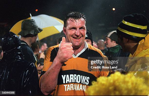 Taranaki lock Kevin Barrett celebrates the win against Waikato in the NPC clash at the Bull Ring, Friday, in torrential rain.