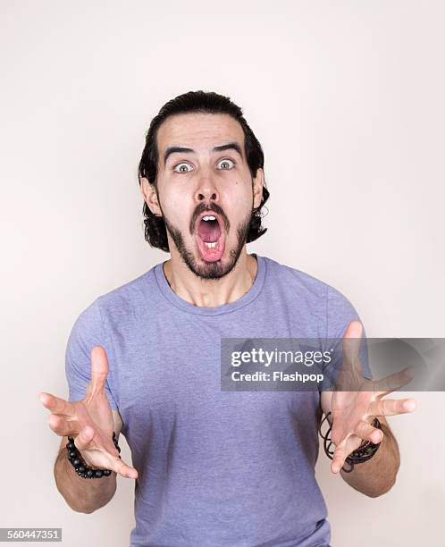 man with shocked expression - hysteria fotografías e imágenes de stock
