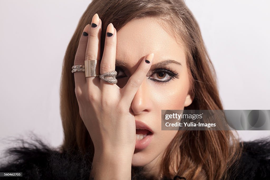 Stylish Woman Touching her Face Sensually