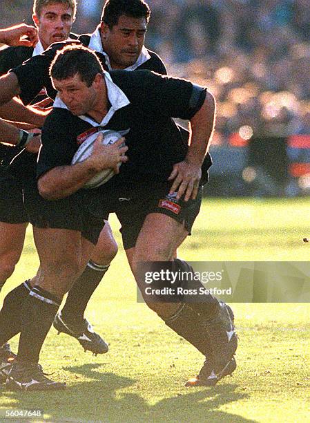 All Black Captain Sean Fitzpatrick makes a break against South Africa at Eden Park 1997.