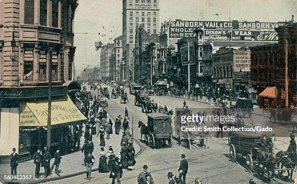Market Street, with pedestrians in formal dress, horse drawn carriages, and storefronts, some with selective hand coloring, and the Sanborn Vail and...