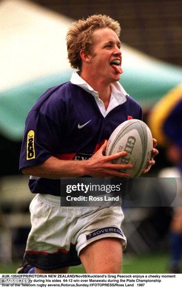 Auckland's Greg Peacock enjoys a cheeky moment as he scores a try