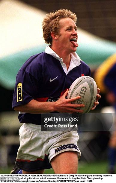 Auckland's Greg Peacock enjoys a cheeky moment as he scores a try during his sides 6412 win over Manawatu during the Plate Championship final of the...