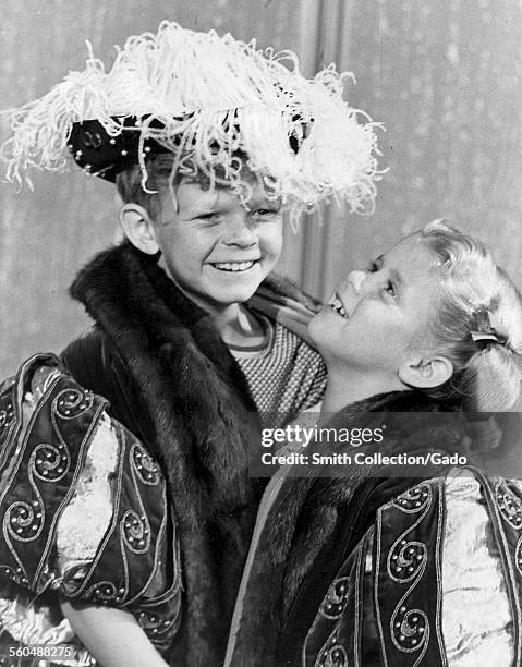 Anissa Jones and Johnny Whitaker during filming of the television show 'Family Affair,' wearing royal outfits and smiling, March 28, 1969.