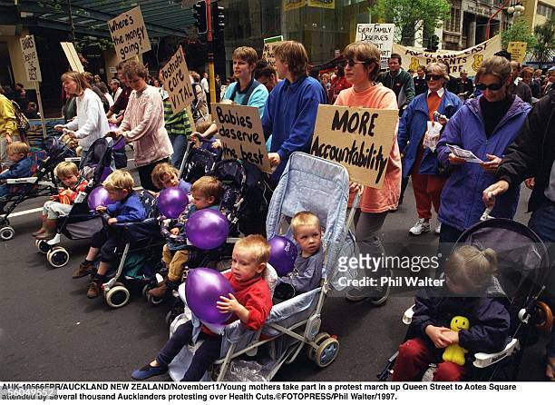 Young mothers take part in a protest march up Queen Street to Aotea Square rattended by several thousand Aucklanders protesting over Health Cuts.