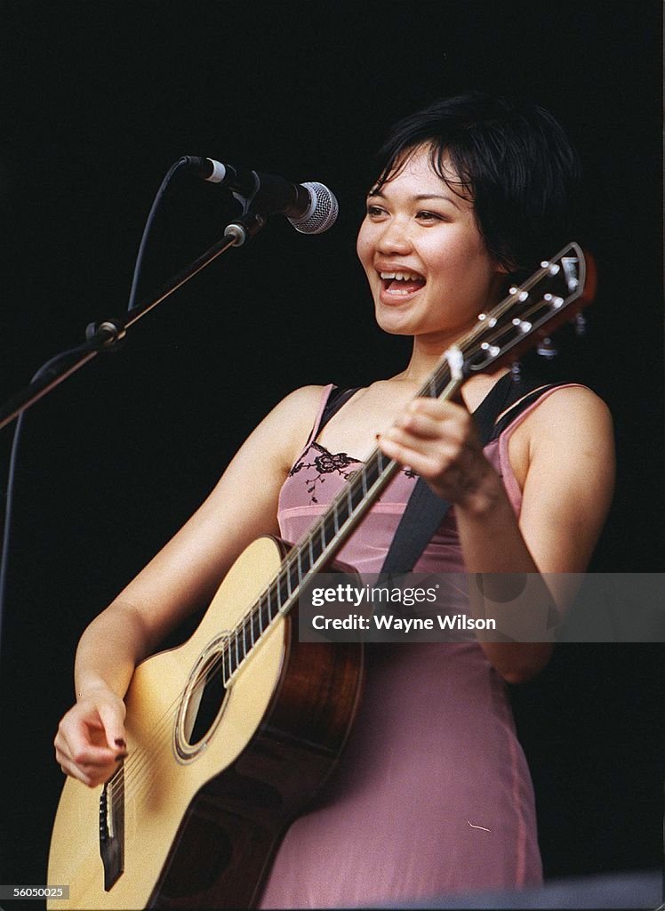 New Zealand's Bic Runga performs to the crowd during