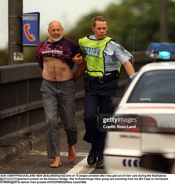 One of 16 people arrested after they got out of their cars during the Multilateral Agreement Investment protest on the Harbour Bridge. The Te...