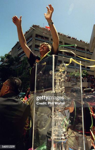 Team New Zealand's Sir Peter Blake alongside the America's Cup is overwhelmed by the thousands of fans who turned out for their victory parade down...