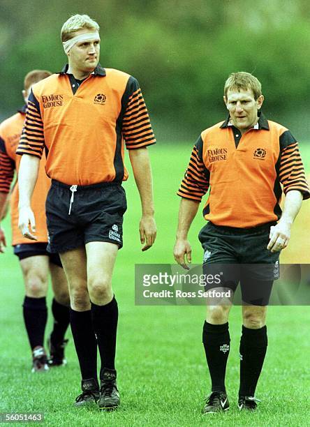 Scotland's Doddie Weir, left and captain Gary Armstrong at training in Edinburgh, Monday, for the quarter final playoff against Manu Samoa, Wednesday...