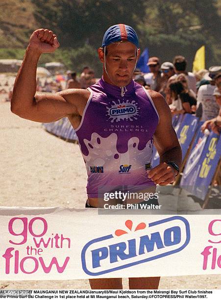 Maui Kjeldson from the Mairangi Bay Surf Club finishes rthe Primo Surf Ski Challenge in 1st place held at Mt Maunganui beach, Saturday.