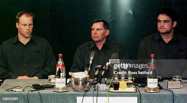 All Black coach John Hart, flanked by Jeff Wilson and Taine Randell announce the team to meet England in the pool match at Twickenham, Saturday at...