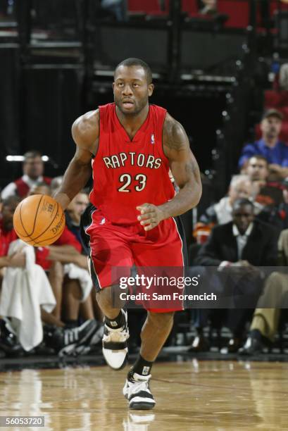 Corey Williams of the Toronto Raptors moves the ball against the Portland Trail Blazers during a preseason game on October 26, 2005 at the Rose...