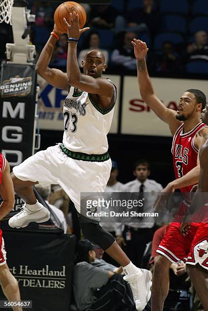 Trenton Hassell of the Minnesota Timberwolves looks to pass during a preseason game against the Chicago Bulls at Target Center on October 26, 2005 in...