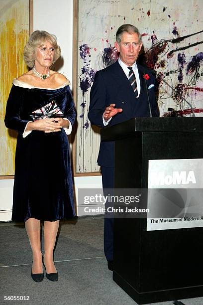 Prince Charles, Prince of Wales, speaks as his wife Camilla, Duchess of Cornwall, looks on at the Museum of Modern Art reception on the first day of...