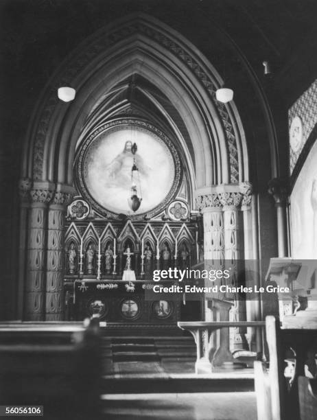 Painting of 'The Ascension of Christ' above the reredos in All Souls' Chapel, part of St Peter's Anglican Cathedral in Charlottetown, Prince Edward...