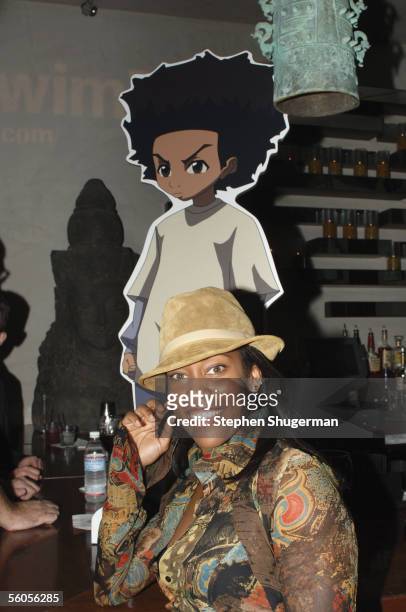 Actress Regina King poses with the cut-out of the character she voices at the Los Angeles Launch Party For The TV Series "The Boondocks" at Mood on...