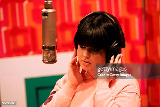 Musical artist Kelly Osbourne records the Tsunami relief charity single, a cover of the Sir Eric Clapton ballad "Tears In Heaven" , at a Los Angeles...