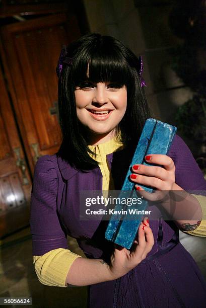 Kelly Osbourne signs symbolic blue bricks as she records her contribution to the new disaster relief charity single, a cover of the Sir Eric Clapton...