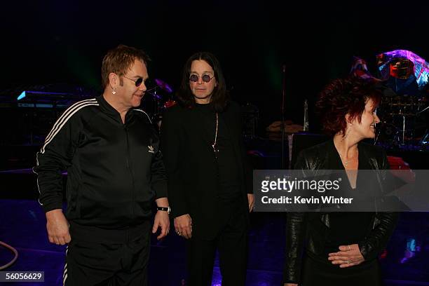 Sir Elton John takes a break with Ozzie and Sharon Osbourne as he records his contribution to the new disaster relief charity single, a cover of the...