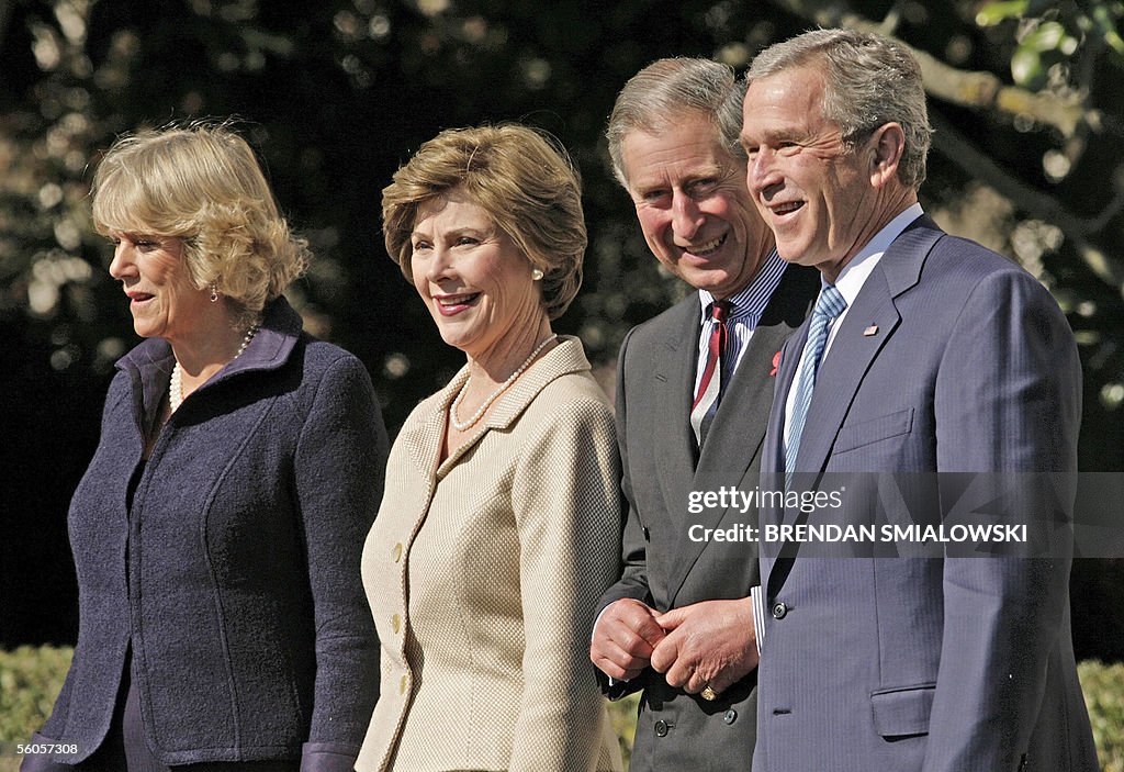 US President George W. Bush (R) and Firs