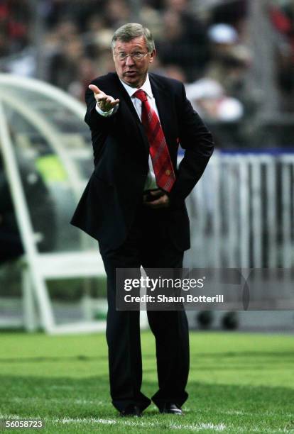 Sir Alex Ferguson, the Manchester United manager, shouts instructions to his team during the UEFA Champions league match between Lille and Manchester...