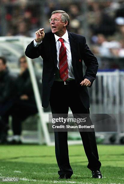 Sir Alex Ferguson, the Manchester United manager, shouts instructions to his team during the UEFA Champions league match between Lille and Manchester...