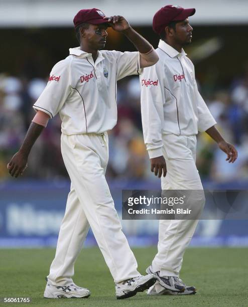 Shivnarine Chanderpaul captain of the West Indies leaves the field with his vice-captain Ramnaresh Sarwan during day one of the First Test between...