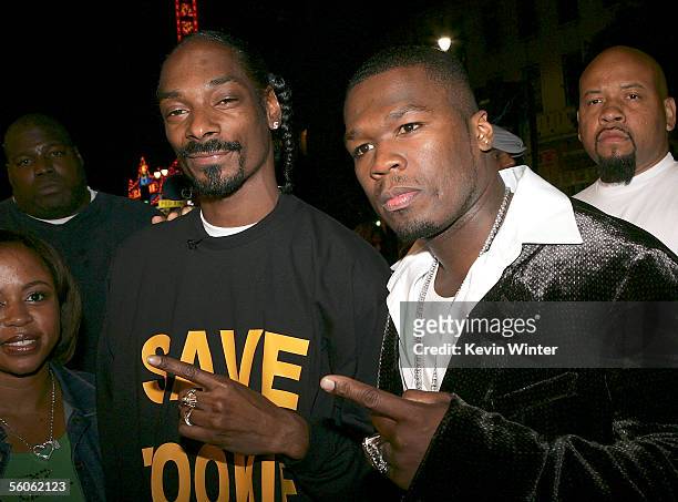 Rapper Snoop Dogg and actor/Singer Curtis "50 Cent" Jackson arrive at the Premiere Of "Get Rich Or Die Trying" at Grauman's Chinese Theater on...