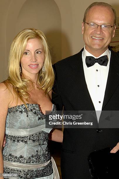 Actor Kelsey Grammer and wife Camille Donatacci Grammer walk through the Booksellers room in the White House en route to a social dinner in honor of...