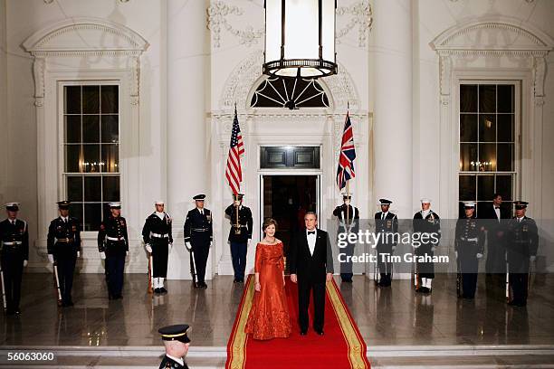 President George W Bush and First Lady Laura Bush attend a dinner held at the White House on the second day of the visit by the Prince of Wales and...