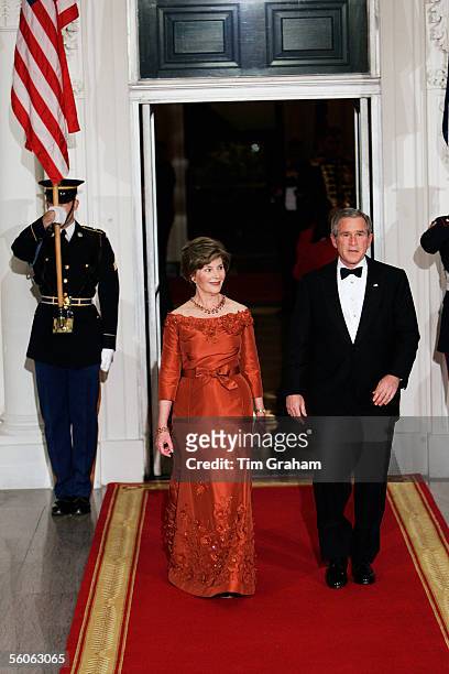 President George W Bush and First Lady Laura Bush attend a dinner held at the White House on the second day of the visit by the Prince of Wales and...