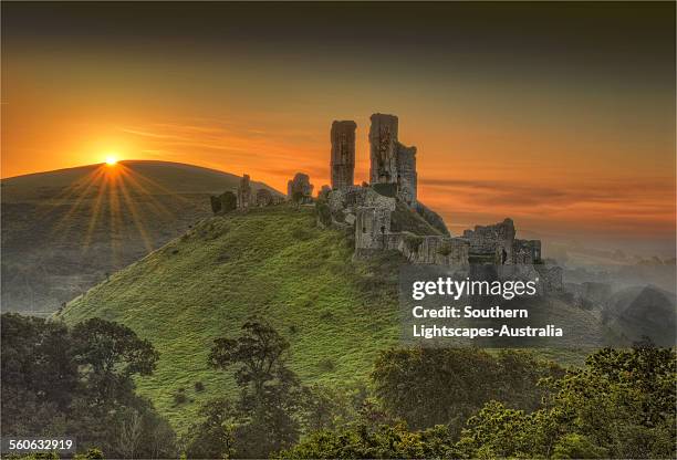 corfe castle sunrise - corfe castle stock pictures, royalty-free photos & images