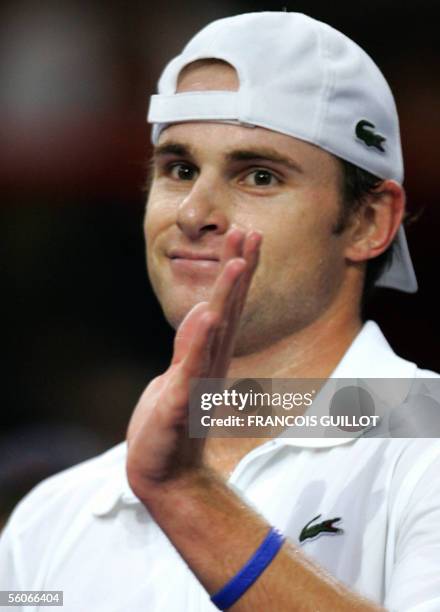 Andy Roddick of the US jubilates after winning over Dominik Hrbaty of Slovakia during their Paris Tennis Masters Series third round match at Bercy...