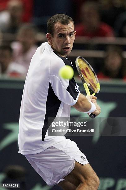 Dominik Hrbaty of Slovakia plays a backhand against Andy Roddick of the USA in his third round match,during the BNP Paribas ATP Masters Series at the...